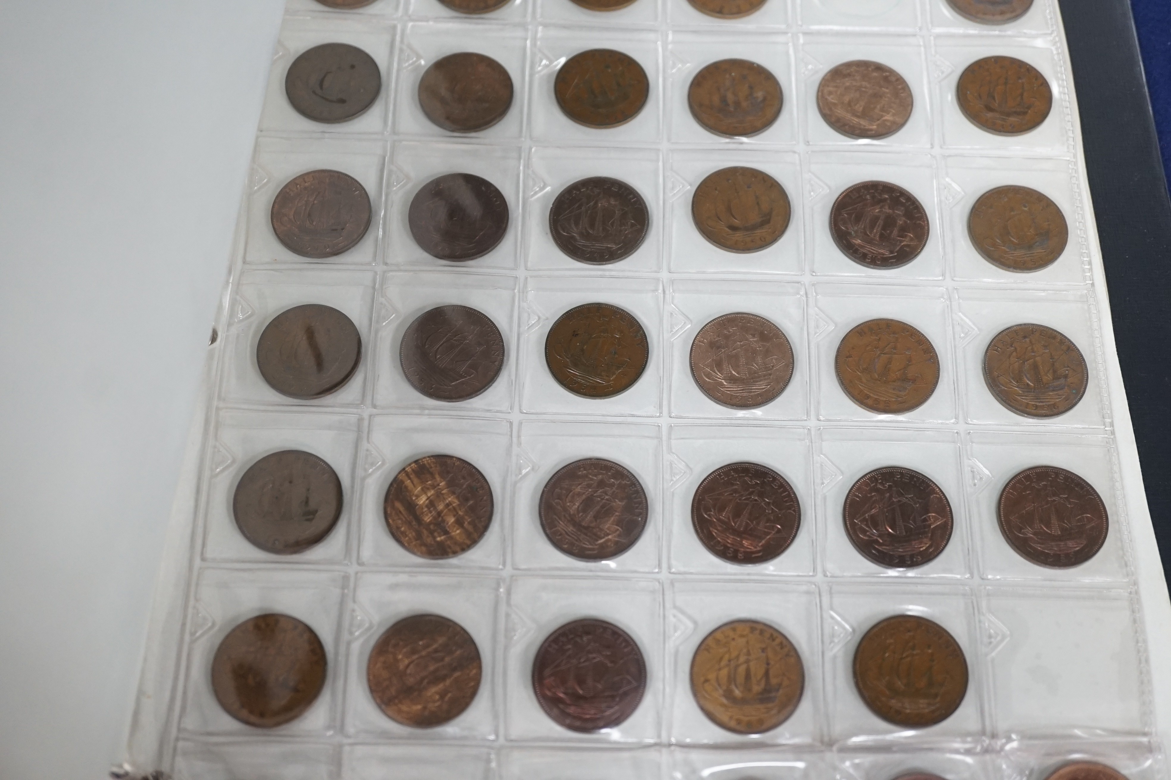 An album of British half pennies and farthings, Charles II to QEII, half pennies include 1730 F, 1806 UNC, 1827 GVD, 1877 lustrous UNC, Farthings including 1788 VF, 1799 EF, 1821 EF and decimal pennies